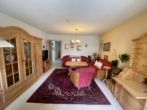 Wohnzimmer - — RESERVIERT — „MIT WEITBLICK INVESTIEREN“ 2-ZIMMER-EIGENTUMSWOHNUNG mit großem BALKON ALS KAPITALANLAGE !