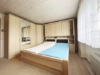 Schlafzimmer EG - — VERKAUFT — 2-FAM.HAUS / 2x ETW mit GARTEN/GARAGEN+PV-ANLAGE – DIREKT am ORTSRAND! LENGENFELD – GEM.PÜRGEN – 5km von LL