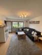 Wohnzimmer - — VERKAUFT — SCHICKE – GERÄUMIGE 3/4 ZIMMER-ETW mit großem BALKON in RUHIGER WOHNLAGE von BUCHLOE!